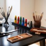 an artist's work table and the tools used